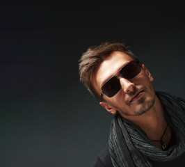 portrait of a handsome guy, wearing sunglasses