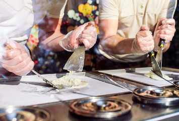 stir-fried ice cream rolls at freeze pan. Organic, natural rolled ice cream, hand made dessert.