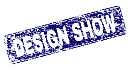 DESIGN SHOW stamp seal print with distress style. Seal shape is a rounded rectangle with frame. Blue vector rubber print of DESIGN SHOW text with grunge texture.