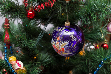 blue Christmas ball with a pattern on the Christmas tree, Christmas decorations