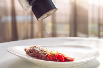 The Dish Is Carpaccio. Waiter Pepper dish.
