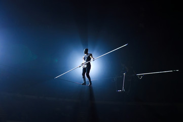 Tightrope walkers at the circus.