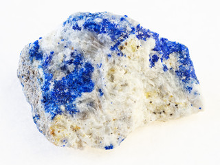 sample of lazurite (lapis lazuli) stone on white