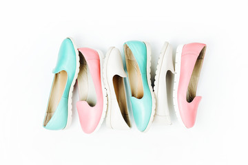 Stylish female shoes in pastel colors. Beauty and fashion concept. Flat lay, top view
