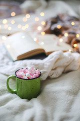 Christmas composition. garland book and marshmallow mug. Flat la
