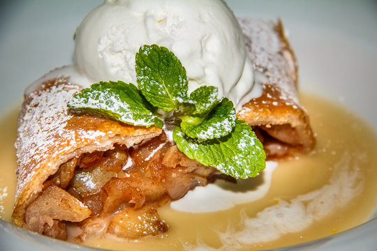 Apple strudel with ice cream and mint