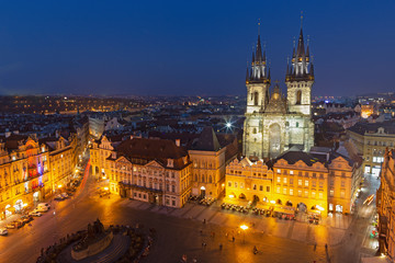 Fototapeta na wymiar Prague - The Orloj on the Old Town hall, Staromestske square and Our Lady before Týn church at dusk.