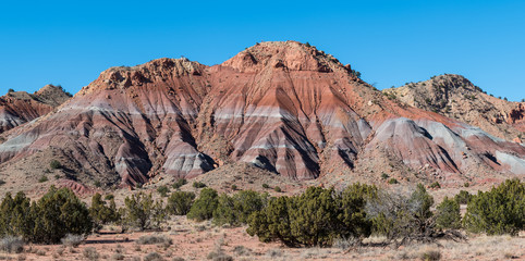 Panorama of a colorful mountain peak in the high desert near Abiquiu, New Mexico in the American Southwest