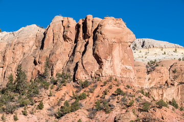 Fototapeta premium Colorful rugged cliffs and rock formations in the Rio Chama canyon near Abiquiu, New Mexico