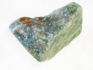 rough green aventurine stone on white