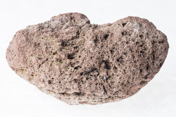 brown volcanic pumice stone on white