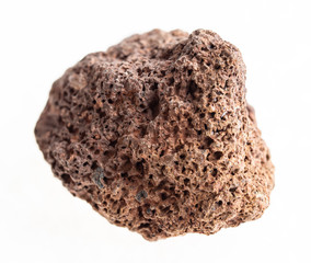 brown porous pumice stone on white