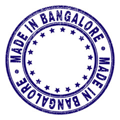 MADE IN BANGALORE stamp seal imprint with grunge texture. Designed with circles and stars. Blue vector rubber print of MADE IN BANGALORE caption with corroded texture.