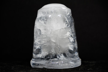 Obraz premium a piece of ice on a black background