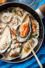 Mussels with Blue Cheese Sauce and Garlic Baguette.