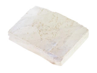raw white calcite stone on white
