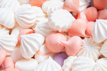 Fototapeta na wymiar Multicolored meringue in small pieces