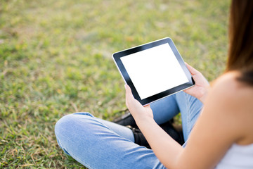 Woman holding digital tablet