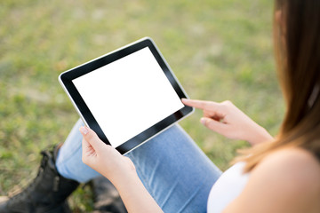 Woman holding digital tablet