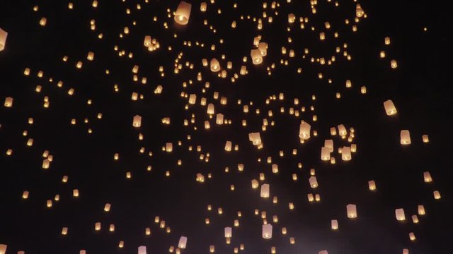 Tourist floating sky lanterns in Loy Krathong festival , Chiang Mai ,Thailand.