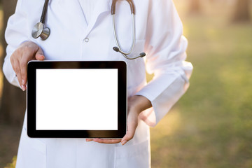 Doctor Using Digital Tablet outdoors