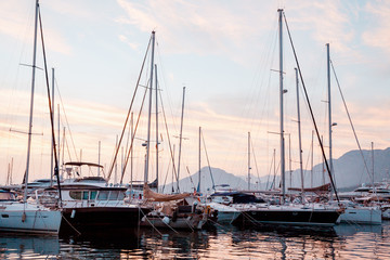 Fototapeta na wymiar yacht bay on amazing backgrount with city and mountains