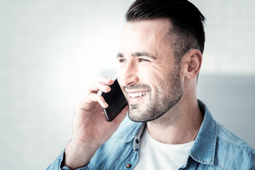 Handsome brunette male demonstrating his smile