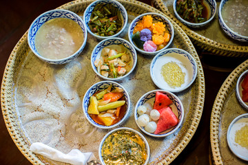 Delicious thai food set served on bamboo plate. lunch and or dinner set of culture thai food. present for traveler and tourist.