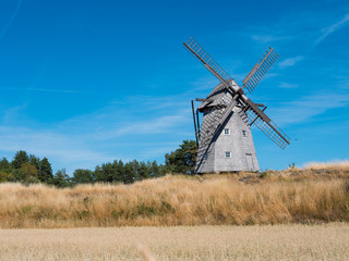 Fototapeta na wymiar very old windmill in the countryside