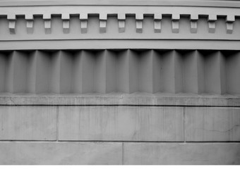Part of architectural decoration of wall in black and white.