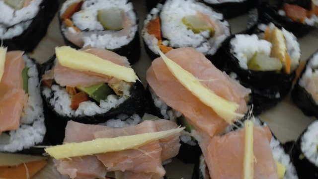 Close Up of Salmon on Suchi Spinning