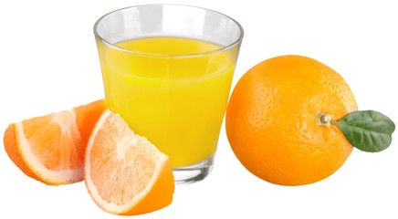 Fresh orange and glass of juice