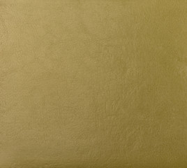 Green leather surface as a background, skin texture. Skin textur