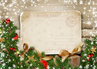 Greeting card Merry Christmas with decorations and vintage postcard