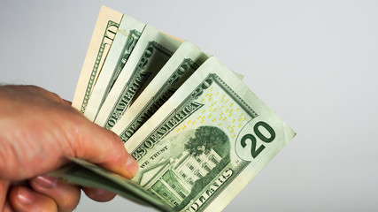 man gives a handful of money