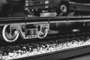 Obraz premium wheels of a toy train on rails