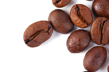 Roasted coffee beans isolated on white background. Three coffee beans