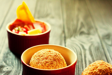 Gluten Free Stuffed Aranchini - traditional italian food. Balls filled with meat, tomatoes, pepper and mozarella