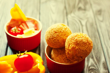 Gluten Free Stuffed Aranchini - traditional italian food. Balls filled with meat, tomatoes, pepper and mozarella