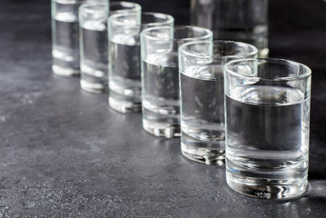 Six shots of vodka in a row. Copy space