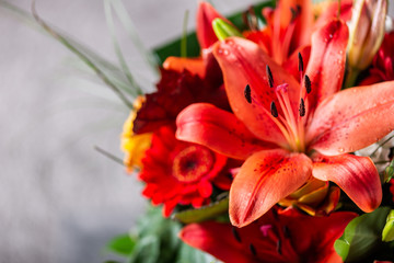 Vibrant Bouquet of orange Asiatic lilies and other flowers