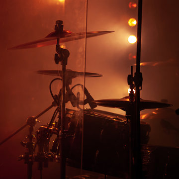 Rock drum set  with cymbals in red lights