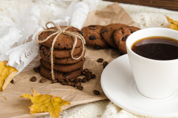 coffee cookies with chocolate and a cup of black coffee