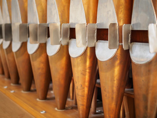 Copper organ pipes close up