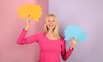 Speech bubble banner. Happy girl hold empty speech bubbles. Blonde woman with advertising card....