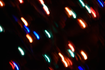 Fototapeta na wymiar Long exposure. Colorful lights bokeh