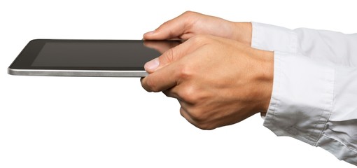 Human hands holding a tablet