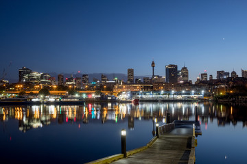 Fototapeta na wymiar Sydney's Fish Market and city skyline before sunrise