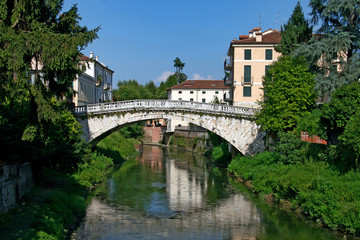 Fototapeta na wymiar Vicenza, Veneto / Italy - August 2008: Ponte San Michele, ancient stone bridge in the historic city centre