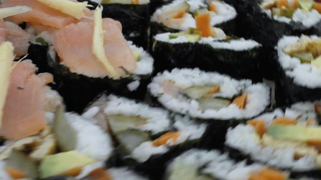 Close Up of Suchi Board Spinning Right to Left
